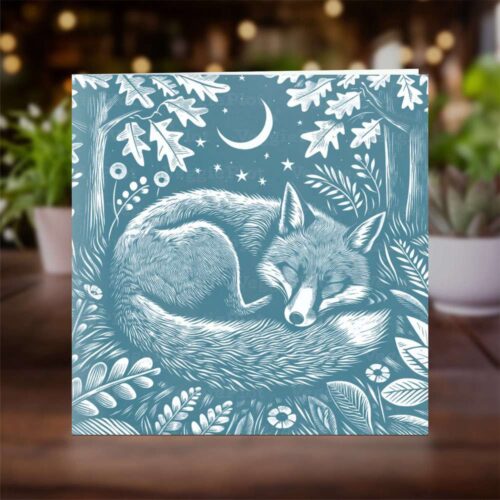 A greeting card with a sleeping fox image